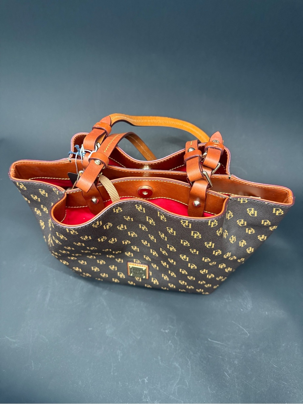 Dooney & Bourke Brown Monogram Tote with Red Lining